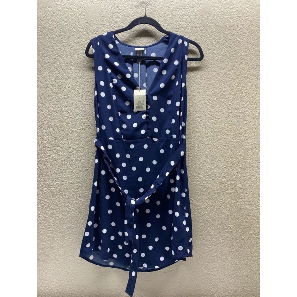 medium navy and white sleeveless polka dot mini dress from the brand A New Day,
